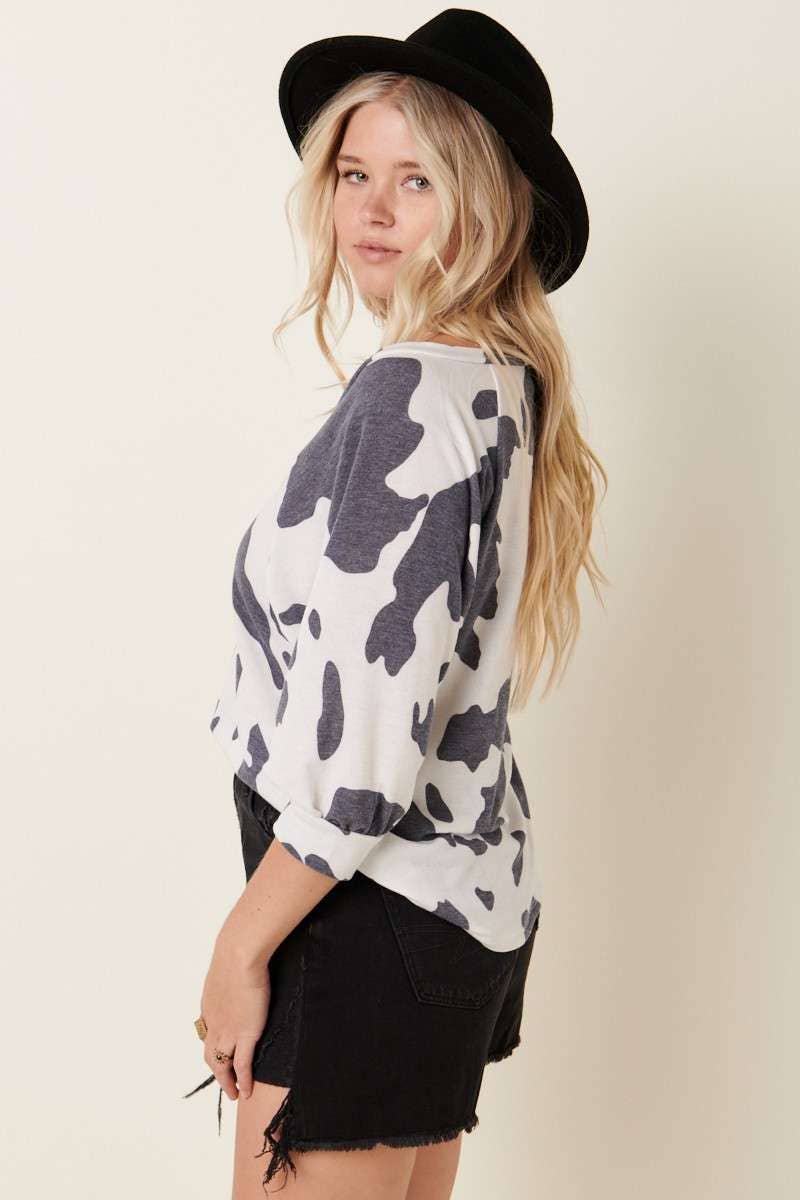 COW PRINT RAGLAN SLEEVE KNIT TOP